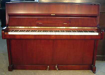 A grand upright piano for sale