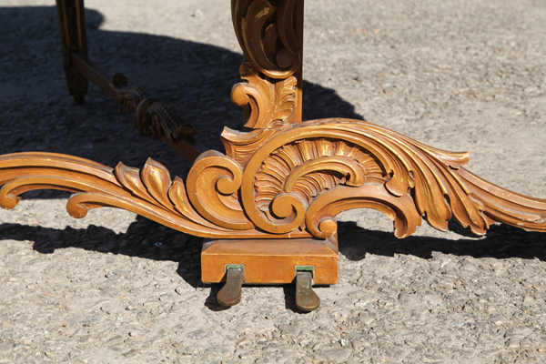 Carved rococo style leg stretcher  