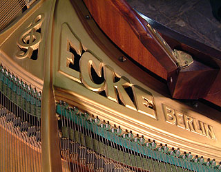Ecke Grand Piano for sale.
