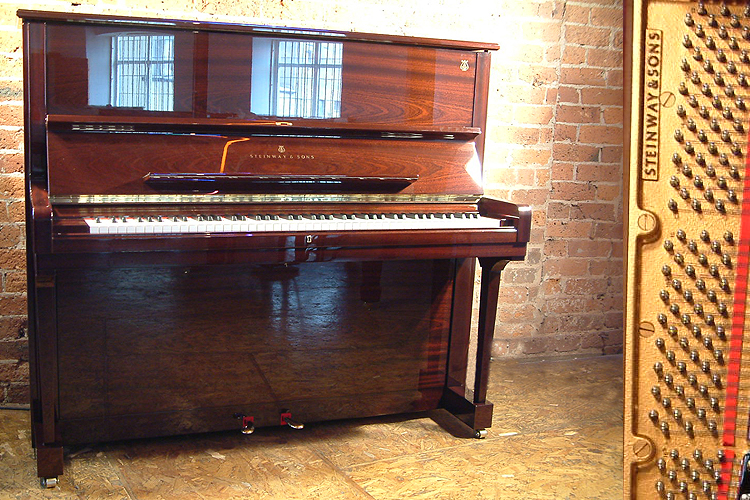 Brand new,  Steinway Model K  upright piano with a mahogany case and polyester finish