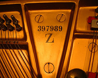Steinway Model Z Upright Piano for sale. We are looking for Steinway pianos any age or condition.