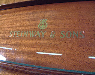 Steinway Model Z Upright Piano for sale. We are looking for Steinway pianos any age or condition.