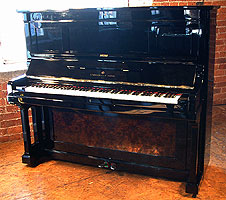 Antique Steinway upright piano for sale with a black case and reversible burr walnut panels.