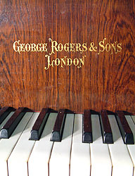 Rogers Grand Piano for sale.