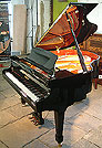 A brand new Wendl & Lung Model 161 Professional  Grand with a black case and polyester finish. 