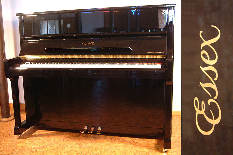 Brand new,  Essex 123 upright piano with a black case