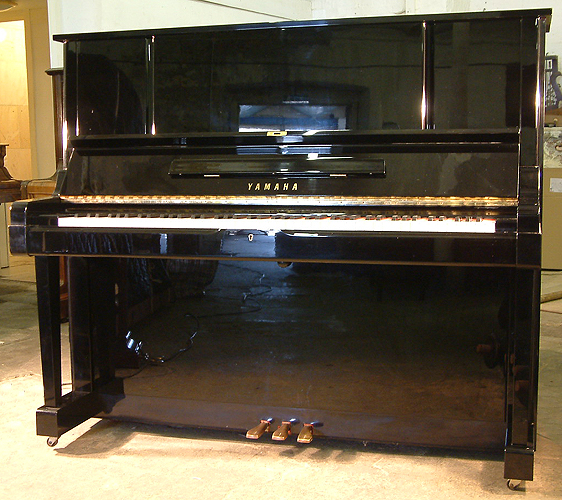 Yamaha YUX upright Piano for sale.