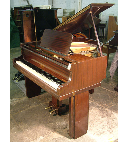A 1939, Art Deco Allison baby grand piano with a polished mahogany case