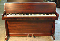 An Allison upright piano with a polished mahogany case