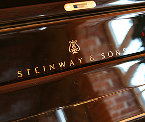 Steinway Model K upright Piano for sale.