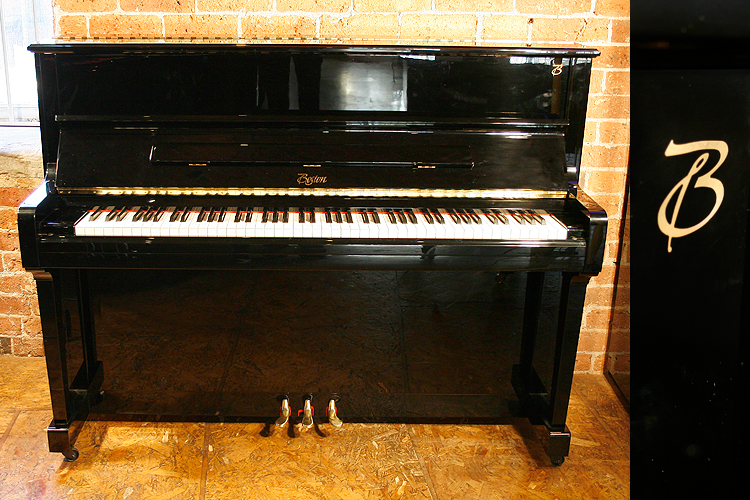 Brand new,  Boston UP118 upright piano with a black case