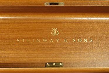 Steinway Model V Upright Piano for sale with a walnut case.