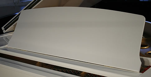 A brand new Steinhoven Model 148 baby grand piano with a white case and polyester finish White Steinhoven Model 148 BAby Grand Piano for sale. We are looking for Steinway pianos any age or condition.
