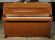 A Bentley upright piano with a mahogany case