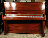 An american  Steinway Model V upright piano with a mahogany case. 