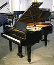 A Yamaha C5 grand piano for sale with a black case and polyester finish. 