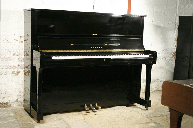 Yamaha U1  upright piano with a black case and polyester finish