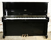 A Yamaha U1 upright piano with a black case and polyester finish. 