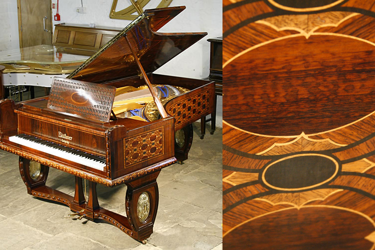 A unique, Bluthner grand piano with a Jacaranda case with intricate marquetry inlay. all over case in a variety of designs and woods. Case shows tessellated marquetry panels in walnut, ebony, mahogany, fiddleback mahogany and boxwood