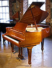 A pre-owned, Boston GP 163 grand piano with a walnut case and polyester finish