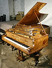 An antique, Bechstein Model C grand piano with an exquisite, burr walnut case. 