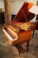 A 1904, Bechstein Model B grand piano with a mahogany case.