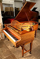 A 1904, Bechstein Model B grand piano with a rosewood case.