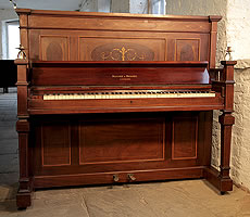 Arts and Crafts Moore and Moore upright piano with an inlaid mahogany case