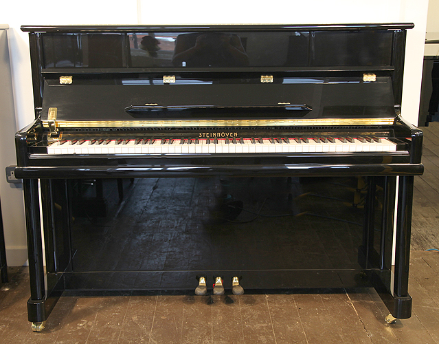 Piano for sale. A brand new Steinhoven Model 112 upright piano with a black case