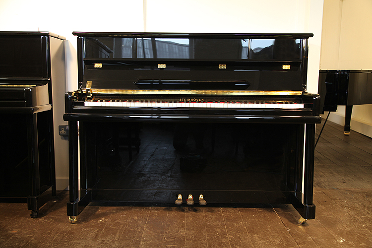 Brand new,  Steinhoven model 112 upright piano with a black case