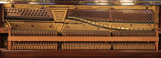 Strohmenger Upright Piano for sale.