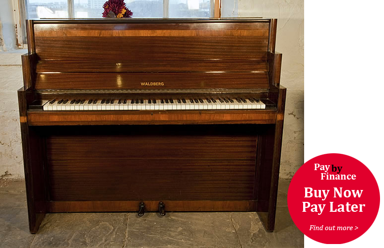Waldberg upright Piano for sale.