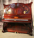 Piano for sale. A 1914, Art Nouveau, Knauss upright piano with a mahogany case with carved flowers and tendrils.