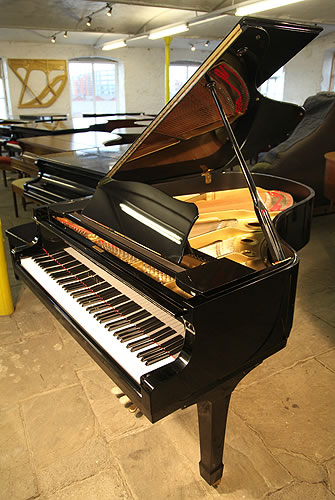Yamaha C3 grand Piano for sale with a black case and polyester finish.