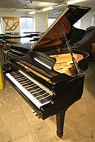 Yamaha C3 grand piano for sale with a black case