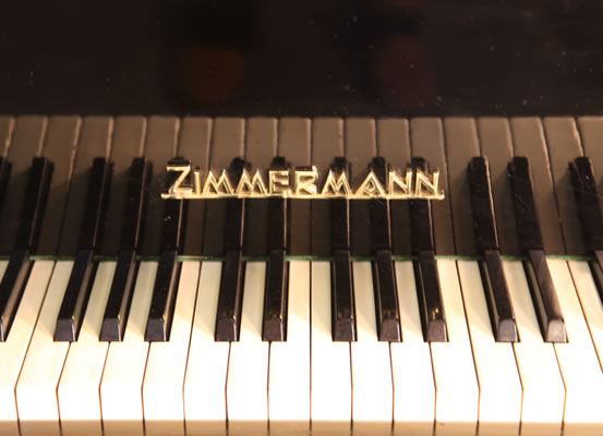 Zimmermann piano manufacturers logo on fall