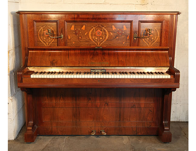 A 1912, Bechstein Model III upright piano with a rosewood case and floral inlaid panels