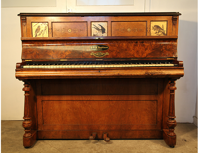 An 1870, Hopkinson upright piano for sale with a burr walnut case. Cabinet features hand painted panels of birds