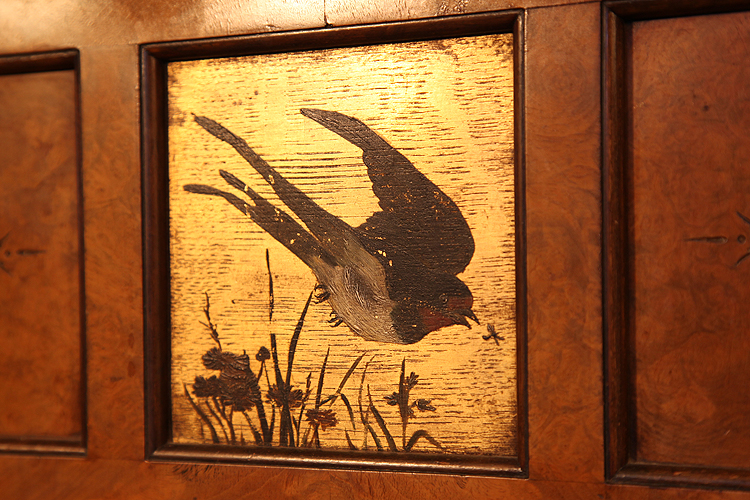 Hand painted bird on  a gold ground