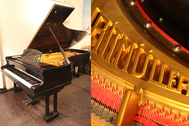 A 1922, Ritmuller concert grand piano with a black case and Doric style, fluted column legs 