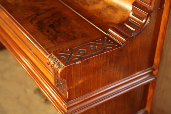 Schmidt carved piano cheek detail