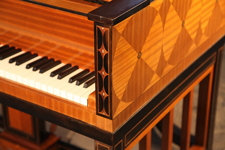 Steinway high piano cheek with geometric mahogany inlay with mother of pearl accents 
