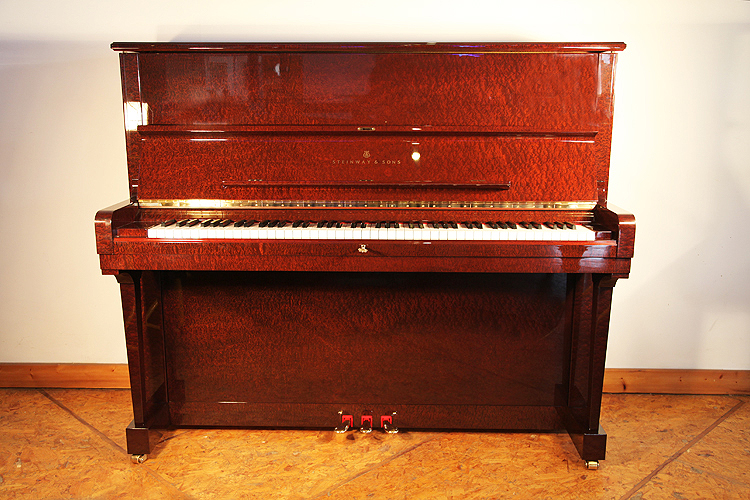 A 2003, Steinway Model V upright piano with a beautiful, sapele mahogany case