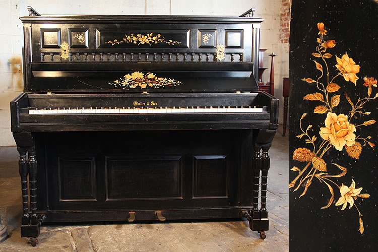 An 1884, Challen upright piano with a black case. Cabinet features spindles and floral decor on panels