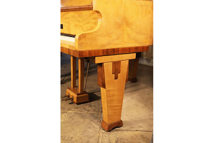 Monington and Weston piano leg with rosewood geometric inlay