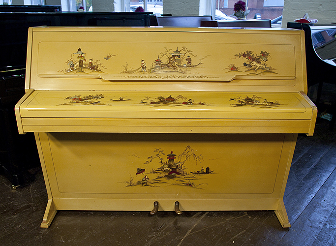 Piano for sale. A Monington and Weston upright piano with a green case, covered in Chinese painting