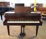 Piano for sale. A Squire butterfly baby grand piano with a mahogany case