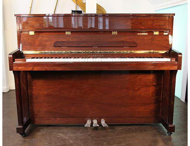 A brand new Steinhoven UP113 upright piano with a mahogany case and polyester finish