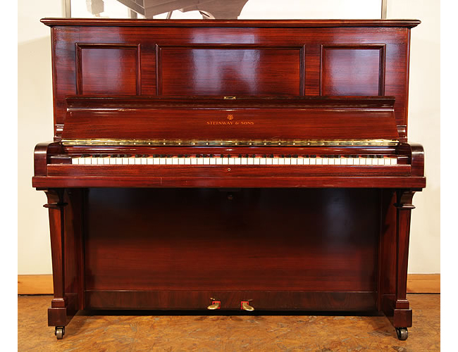  A 1920, Steinway Model K vertegrand upright piano with a rosewood case