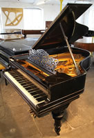 A 1905, Steinway Model A grand piano with an ebonised case and carved, turned legs